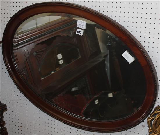 Mahogany oval wall mirror